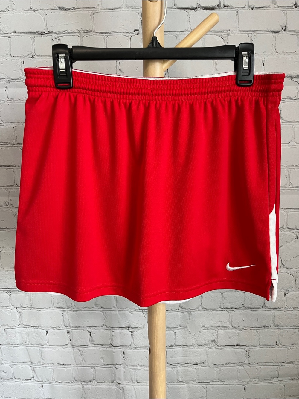 Nike Women's Red Athletic Skirt with White Stripe and Swoosh